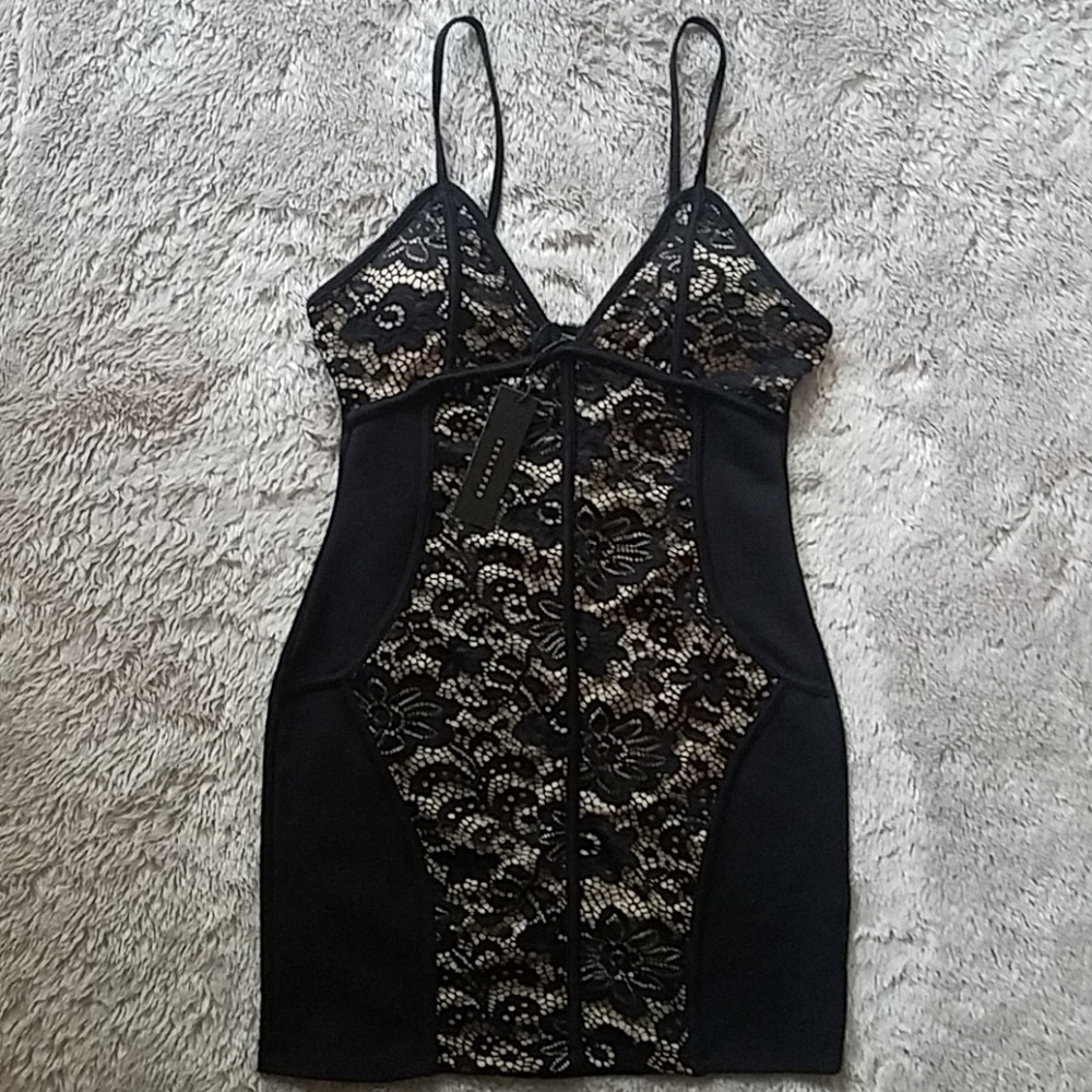 Black and nude mini dress